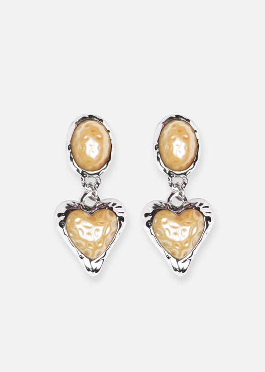 Vintage-inspired pearl heart drop earrings. Rhodium-plated brass, lightweight design. Support sustainability!