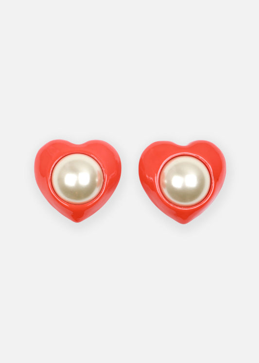 Aya's vintage-inspired heart earrings exude '80s glamour. Handcrafted from resin & enamel, featuring vintage pearl, they're lightweight with clip-ons for comfort.
