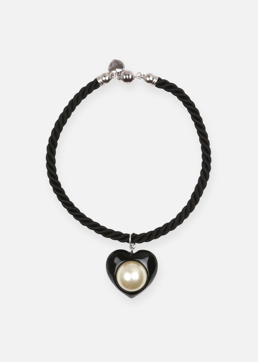 Handmade silk cord necklace with enamel heart pendant.
